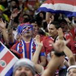 
              Soccer fans from Costa Rica wait for the start of the World Cup group E soccer match between Costa Rica and Germany at the Al Bayt Stadium in Al Khor , Qatar, Thursday, Dec. 1, 2022. (AP Photo/Hassan Ammar)
            