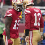 
              San Francisco 49ers quarterback Brock Purdy (13) is congratulated by wide receiver Deebo Samuel (19) after scoring a touchdown against the Tampa Bay Buccaneers during the first half of an NFL football game in Santa Clara, Calif., Sunday, Dec. 11, 2022. (AP Photo/Tony Avelar)
            