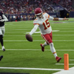 
              Kansas City Chiefs quarterback Patrick Mahomes (15) runs for a touchdown against the Houston Texans during the second half of an NFL football game Sunday, Dec. 18, 2022, in Houston. (AP Photo/David J. Phillip)
            