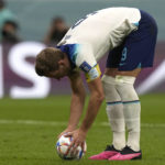 
              England's Harry Kane prepares the ball at the penalty spot during the World Cup quarterfinal soccer match between England and France, at the Al Bayt Stadium in Al Khor, Qatar, Saturday, Dec. 10, 2022. (AP Photo/Frank Augstein)
            