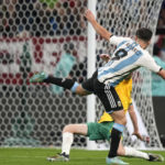 
              Argentina's Julian Alvarez scores his side's second goal during the World Cup round of 16 soccer match between Argentina and Australia at the Ahmad Bin Ali Stadium in Doha, Qatar, Saturday, Dec. 3, 2022. (AP Photo/Lee Jin-man)
            