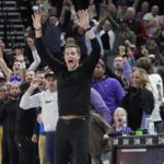 
              Utah Jazz coach Will Hardy reacts after Jazz forward Simone Fontecchio's dunk late in the second half of an NBA basketball game against the Golden State Warriors on Wednesday, Dec. 7, 2022, in Salt Lake City. (AP Photo/Rick Bowmer)
            