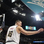 
              Denver Nuggets center Nikola Jokic waits to put the ball in play in the second half of an NBA basketball game against the Utah Jazz, Saturday, Dec. 10, 2022, in Denver. (AP Photo/David Zalubowski)
            