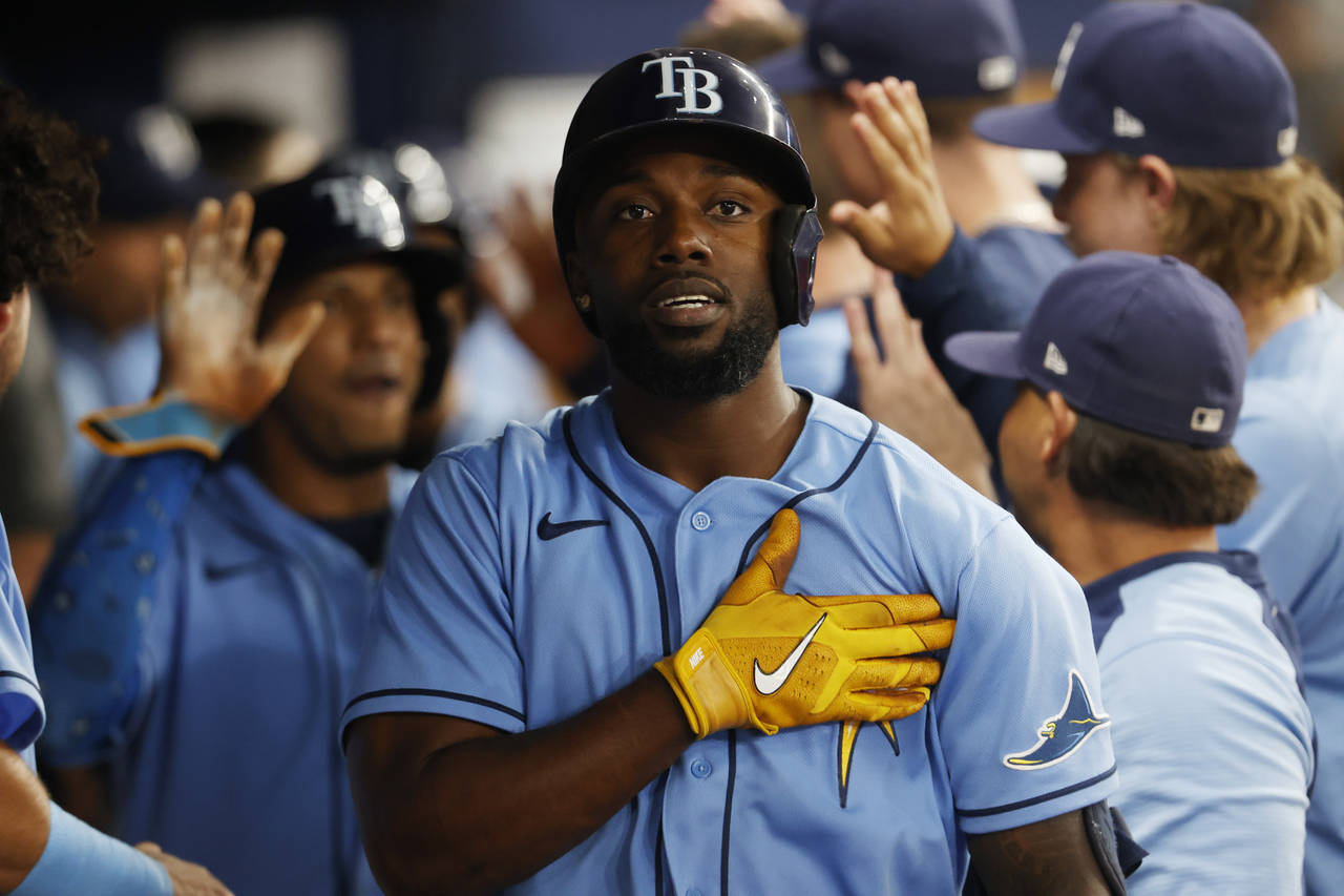 FILE - Tampa Bay Rays' Randy Arozarena reacts in the dugout after hitting a three-run home against ...