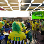 
              A fan wears a shirt in support of Pelé at a Brazilian fan party before the the World Cup round of 16 soccer match between Brazil and South Korea, in Doha, Dec. 5, 2022. The 82-year-old Pelé remained in a hospital in San Paulo recovering from a respiratory infection that was aggravated by COVID-19, but the news coming from Brazil early Monday was good. (AP Photo/Ashley Landis)
            