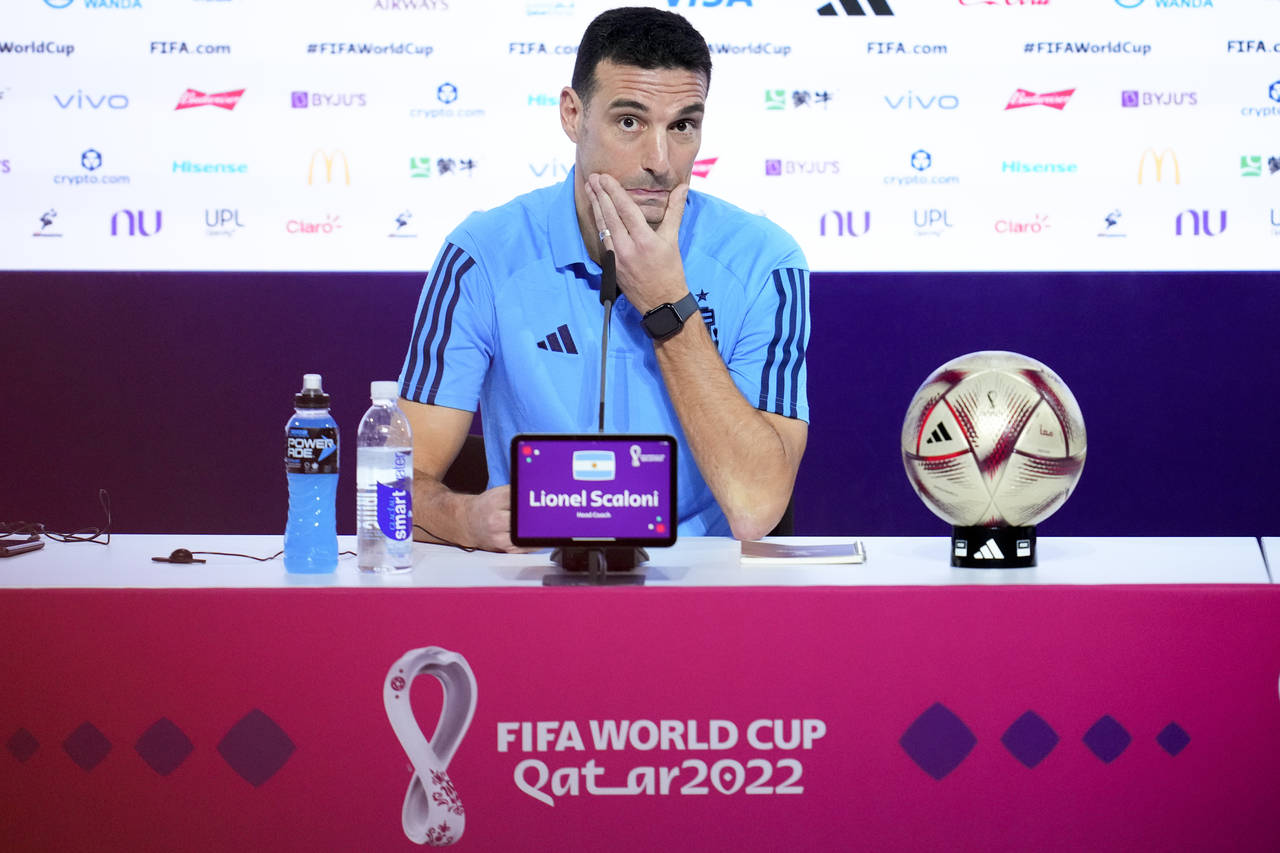 Argentina's head coach Lionel Scaloni attends a press conference ahead of the semifinal soccer matc...
