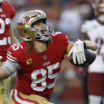 
              San Francisco 49ers tight end George Kittle reacts after making a catch in the second half of an NFL football game against the Washington Commanders, Saturday, Dec. 24, 2022, in Santa Clara, Calif. (AP Photo/Jed Jacobsohn)
            