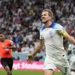 
              England's Harry Kane celebrates scoring his side's second goal during the World Cup round of 16 soccer match between England and Senegal, at the Al Bayt Stadium in Al Khor, Qatar, Sunday, Dec. 4, 2022. (AP Photo/Frank Augstein)
            
