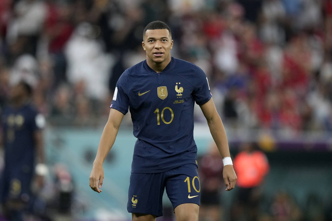 France's Kylian Mbappe plays during the World Cup group D soccer match between Tunisia and France a...