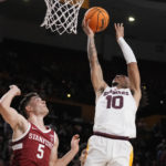 
              Arizona State guard Frankie Collins (10) gets past Stanford guard Michael O'Connell (5) for a basket during the second half of an NCAA college basketball game in Tempe, Ariz, Sunday, Dec. 4, 2022. (AP Photo/Ross D. Franklin)
            
