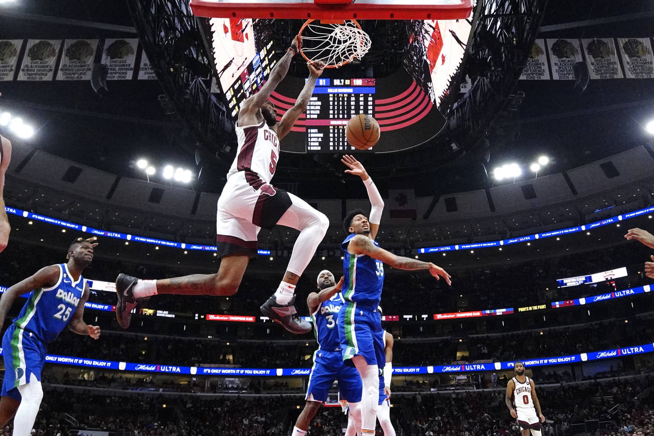 Chicago Bulls forward Derrick Jones Jr. (5) dunks against the Dallas Mavericks during the second ha...