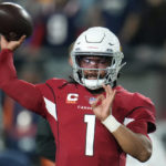 
              Arizona Cardinals quarterback Kyler Murray (1) warms up before an NFL football game against the New England Patriots, Monday, Dec. 12, 2022, in Glendale, Ariz. (AP Photo/Ross D. Franklin)
            