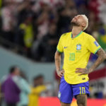 
              Brazil's Neymar reacts at the end of the World Cup quarterfinal soccer match between Croatia and Brazil, at the Education City Stadium in Al Rayyan, Qatar, Friday, Dec. 9, 2022. (AP Photo/Darko Bandic)
            