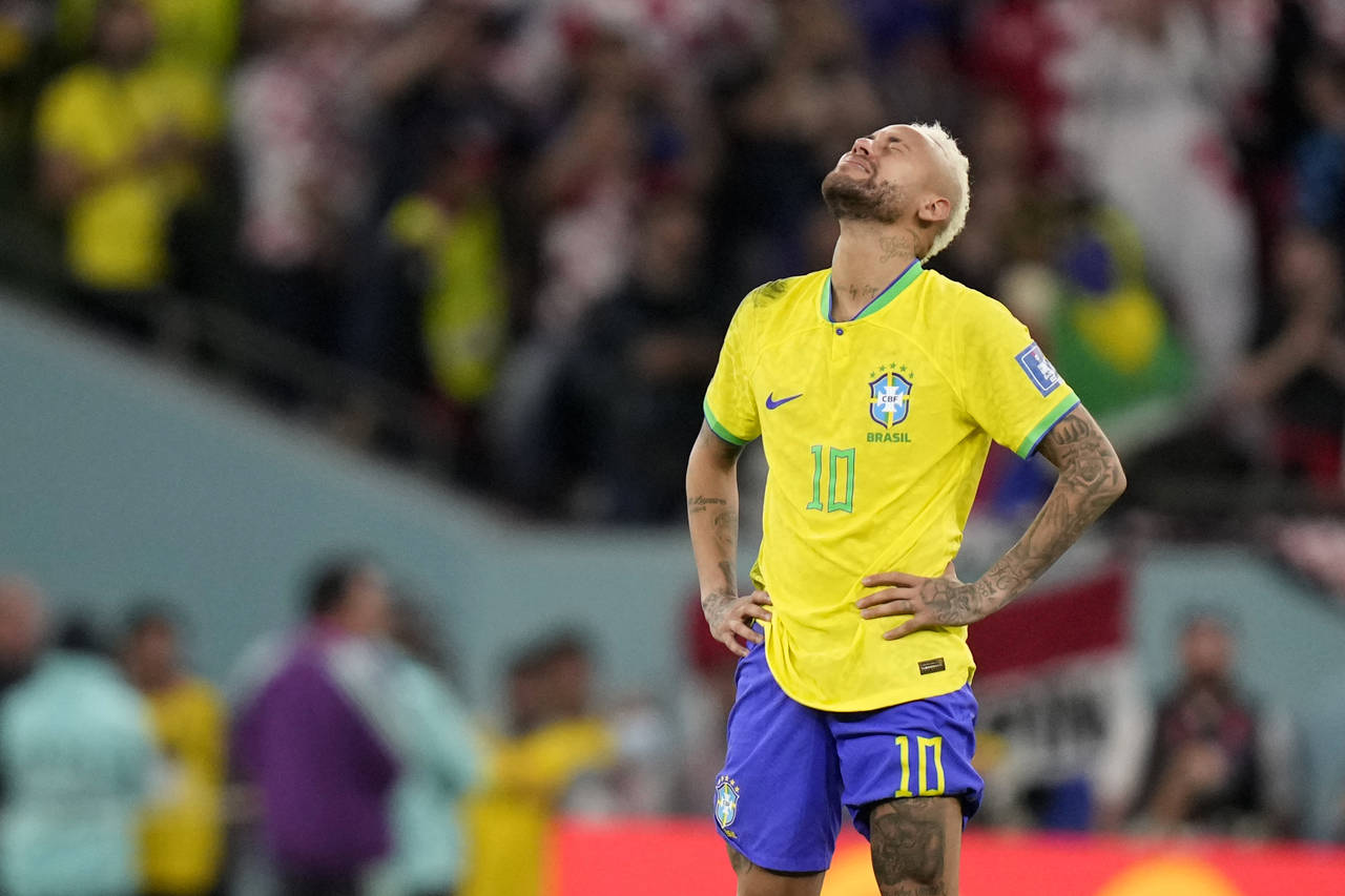Brazil's Neymar reacts at the end of the World Cup quarterfinal soccer match between Croatia and Br...