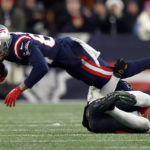 
              New England Patriots wide receiver Kendrick Bourne, left, is brought down by Cincinnati Bengals cornerback Cam Taylor-Britt, right, during the second half of an NFL football game, Saturday, Dec. 24, 2022, in Foxborough, Mass. (AP Photo/Michael Dwyer)
            