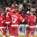 
              The Detroit Red Wings celebrate a goal by left wing Elmer Soderblom, second from left, during the third period of an NHL hockey game against the Tampa Bay Lightning, Wednesday, Dec. 21, 2022, in Detroit. (AP Photo/Carlos Osorio)
            