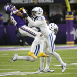 
              Minnesota Vikings wide receiver Justin Jefferson (18) is tackled by Indianapolis Colts cornerback Stephon Gilmore (5) during the second half of an NFL football game, Saturday, Dec. 17, 2022, in Minneapolis. (AP Photo/Andy Clayton-King)
            