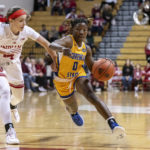 
              Morehead State guard Veronica Charles (0) drives toward the basket while being defended by Indiana guard Sara Scalia (14) during the first half of an NCAA college basketball game, Sunday, Dec. 18, 2022, in Bloomington, Ind. (AP Photo/Doug McSchooler)
            