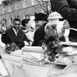 
              FILE - Brazilian soccer star Pele waves to admirers, as he and his bride Rosemeri ride in a traditional horse-drawn carriage as they tour Salzburg, Austria, Feb. 25, 1966. Pelé, the Brazilian king of soccer who won a record three World Cups and became one of the most commanding sports figures of the last century, died in Sao Paulo on Thursday, Dec. 29, 2022. He was 82. (AP Photo/Klaus Frings, File)
            