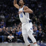 
              Dallas Mavericks guard Spencer Dinwiddie (26) celebrate after sinking a 3-point basketin the first half of an NBA basketball game against the Oklahoma City Thunder, Monday, Dec. 12, 2022, in Dallas. (AP Photo/Tony Gutierrez)
            