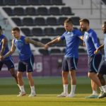 
              (Left-Right) England's Marcus Rashford, Kieran Trippier, Kalvin Phillips, Luke Shaw and England's Raheem Sterling take part in drills during a training session at Al Wakrah Sports Complex on the eve of the Round of 16 World Cup soccer match between England and Senegal, in Al Wakarah, Qatar, Saturday, Dec. 3, 2022. (AP Photo/Abbie Parr)
            