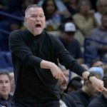 
              Denver Nuggets head coach Michael Malone yells in the first half of an NBA basketball game against the New Orleans Pelicans in New Orleans, Sunday, Dec. 4, 2022. (AP Photo/Matthew Hinton)
            