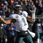 
              Philadelphia Eagles' Jalen Hurts passes during the first half of an NFL football game against the Chicago Bears, Sunday, Dec. 18, 2022, in Chicago. (AP Photo/Nam Y. Huh)
            