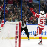 
              Detroit Red Wings' Jonatan Berggren (52) celebrates his goal against the Tampa Bay Lightning during the third period of an NHL hockey game Tuesday, Dec. 6, 2022, in Tampa, Fla. (AP Photo/Chris O'Meara)
            
