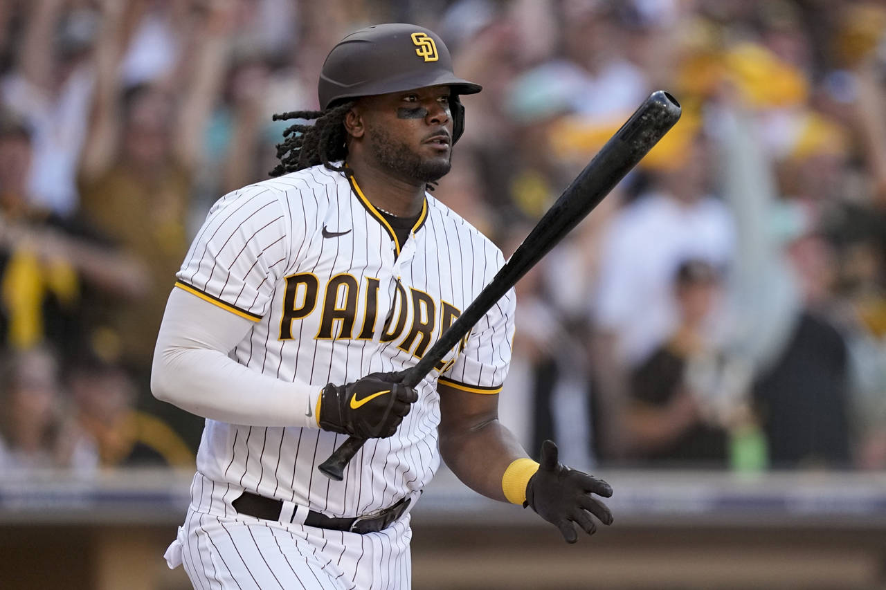 FILE - San Diego Padres' Josh Bell watches hit RBI-single during the fifth inning in Game 2 of the ...