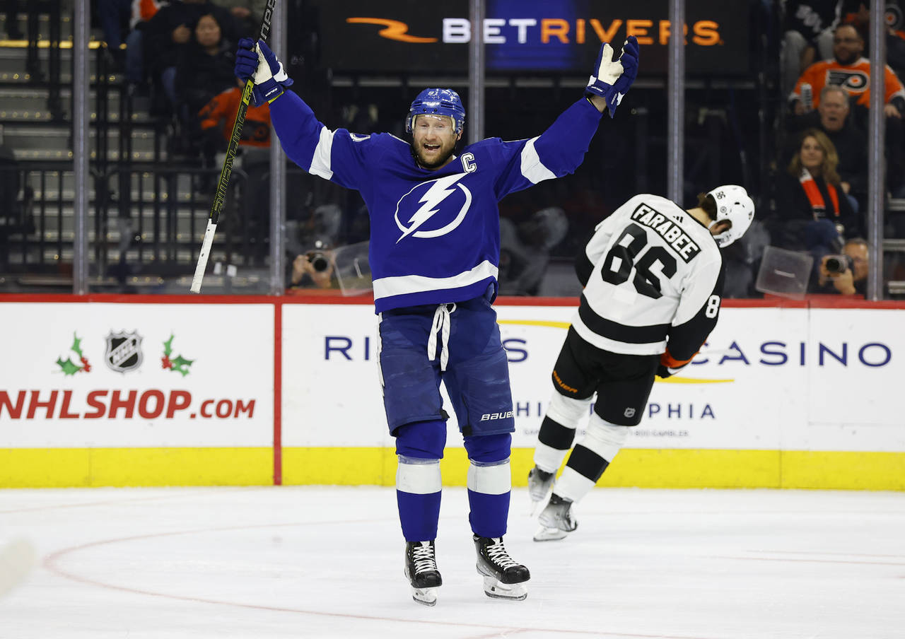 Tampa Bay Lightning's Steven Stamkos celebrates his 1,000th career point after assisting on a goal ...