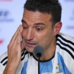 
              Argentina's head coach Lionel Scaloni gets emotional during a press conference at the end of World Cup final soccer match between Argentina and France at the Lusail Stadium in Lusail, Qatar, Sunday, Dec. 18, 2022. Argentina won 4-2 in a penalty shootout after the match ended tied 3-3. (AP Photo/Hassan Ammar)
            