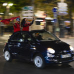 
              FILE - Morocco fans in Marseille, southern France, celebrate after their victory against Spain in the round of 16 soccer match between Morocco and Spain, Tuesday, Dec. 6, 2022. (AP Photo/Daniel Cole, File)
            