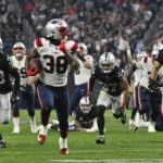 
              New England Patriots running back Rhamondre Stevenson (38) runs for a 34-yard touchdown during the second half of an NFL football game between the New England Patriots and Las Vegas Raiders, Sunday, Dec. 18, 2022, in Las Vegas. (AP Photo/David Becker)
            