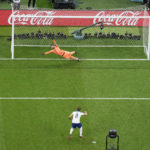 
              England's Harry Kane misses a penalty shot sending the ball over the bar as France's goalkeeper Hugo Lloris dives during the World Cup quarterfinal soccer match between England and France, at the Al Bayt Stadium in Al Khor, Qatar, Saturday, Dec. 10, 2022. (AP Photo/Pavel Golovkin)
            