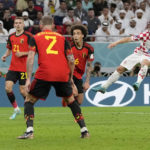 
              Croatia's Luka Modric, right, intends to score a goal during the World Cup group F soccer match between Croatia and Belgium at the Ahmad Bin Ali Stadium in Al Rayyan, Qatar, Thursday, Dec. 1, 2022. (AP Photo/Thanassis Stavrakis)
            