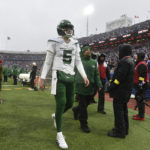 
              New York Jets quarterback Mike White (5) walks to the locker room during the second half of an NFL football game against the Buffalo Bills, Sunday, Dec. 11, 2022, in Orchard Park, N.Y. As a precaution, Jets head coach Robert Saleh said White was sent to the hospital after the game to be evaluated. (AP Photo/Adrian Kraus)
            