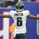 
              Philadelphia Eagles wide receiver DeVonta Smith (6) reacts after scoring a touchdown against the New York Giants during the second quarter of an NFL football game, Sunday, Dec. 11, 2022, in East Rutherford, N.J. (AP Photo/John Minchillo)
            