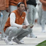 
              Texas head coach Steve Sarkisian watches from the sidelines during the first half of the Alamo Bowl NCAA college football game against the Washington in San Antonio, Thursday, Dec. 29, 2022. (AP Photo/Eric Gay)
            