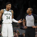 
              Milwaukee Bucks forward Giannis Antetokounmpo (34) talks to referee John Goble after getting called for a technical foul during the second half of an NBA basketball game, Sunday, Dec. 25, 2022, in Boston. (AP Photo/Mary Schwalm)
            