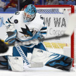 
              San Jose Sharks goaltender Aaron Dell (30) makes a save during the first period of an NHL hockey game against the Buffalo Sabres, Sunday, Dec. 4, 2022, in Buffalo, N.Y. (AP Photo/Jeffrey T. Barnes)
            