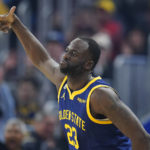 
              Golden State Warriors forward Draymond Green celebrates after scoring a 3-point basket against the Houston Rockets during the first half of an NBA basketball game in San Francisco, Saturday, Dec. 3, 2022. (AP Photo/Godofredo A. Vásquez)
            