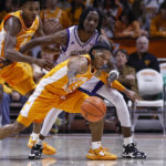 
              Tennessee guard Zakai Zeigler (5) steals the ball from Alcorn State forward Dontrell McQuarter (1) during the first half of an NCAA college basketball game Sunday, Dec. 4, 2022, in Knoxville, Tenn. (AP Photo/Wade Payne)
            