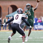 
              William & Mary quarterback Darius Wilson throws a pass over Gardner-Webb's linebacker Tray Dunson during the first half  of an FCS playoffs NCAA college football game at The College of William and Mary in Williamsburg, Va. on Saturday, Dec. 3, 2022. (Daniel Sangjib Min/Richmond Times-Dispatch via AP)
            