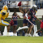 
              Jackson State wide receiver Shane Hooks (5) sprints past a Southern University defender with a 40-yard touchdown pass reception during the first half of the Southwestern Athletic Conference championship NCAA college football game Saturday, Dec. 3, 2022, in Jackson, Miss. (AP Photo/Rogelio V. Solis)
            