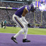 
              Minnesota Vikings wide receiver Justin Jefferson celebrates after catching a 10-yard touchdown pass during the second half of an NFL football game against the New York Jets, Sunday, Dec. 4, 2022, in Minneapolis. (AP Photo/Andy Clayton-King)
            