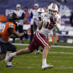 
              Wisconsin safety John Torchio (15) knocks down the ball intended for Oklahoma State wide receiver Brennan Presley during the first half of the Guaranteed Rate Bowl NCAA college football game Tuesday, Dec. 27, 2022, in Phoenix. (AP Photo/Rick Scuteri)
            