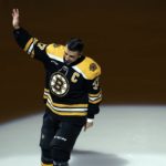 
              Boston Bruins' Patrice Bergeron waves after being honored for his 1,000 career points during a ceremony before an NHL hockey game against the Columbus Blue Jackets, Saturday, Dec. 17, 2022, in Boston. (AP Photo/Michael Dwyer)
            