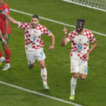 
              Croatia's Josko Gvardiol, right, celebrates after scoring his side's opening goal during the World Cup third-place playoff soccer match between Croatia and Morocco at Khalifa International Stadium in Doha, Qatar, Saturday, Dec. 17, 2022. (AP Photo/Martin Meissner)
            