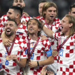 
              Croat players celebrate on the potdium after winning the World Cup third-place playoff soccer match between Croatia and Morocco at Khalifa International Stadium in Doha, Qatar, Friday, Dec. 16, 2022. (AP Photo/Thanassis Stavrakis)
            