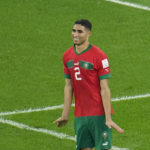 
              Morocco's Achraf Hakimi celebrates after he scored the decisive penalty at the end of the World Cup round of 16 soccer match between Morocco and Spain, at the Education City Stadium in Al Rayyan, Qatar, Tuesday, Dec. 6, 2022. (AP Photo/Ricardo Mazalan)
            